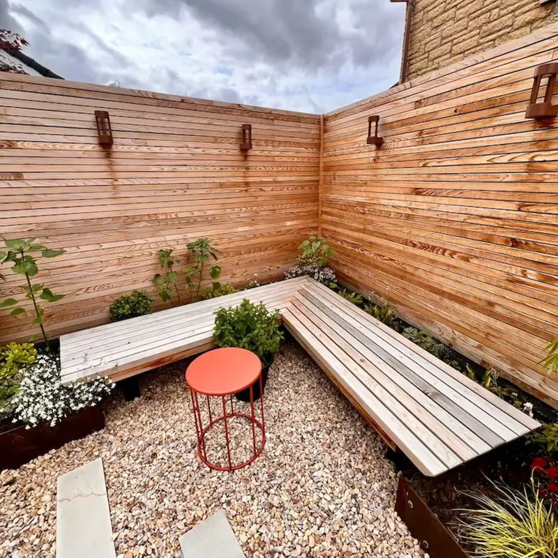 Completed garden with terrace, planting and pergola